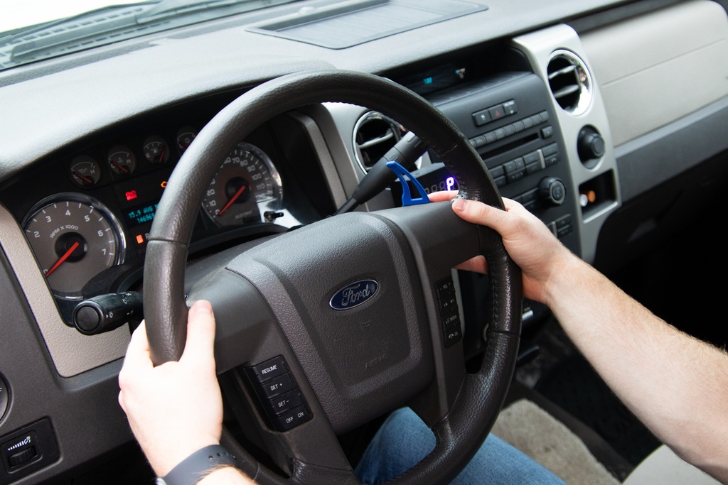 Person using paddle shifters in a 2010 F150